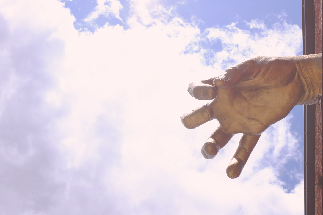 Giant Golden Hand sculpture by Adam Kurtzman